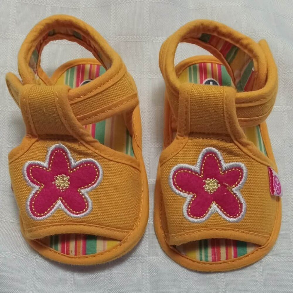 Small orange sandals with pink flowers, year 2005 4 inches